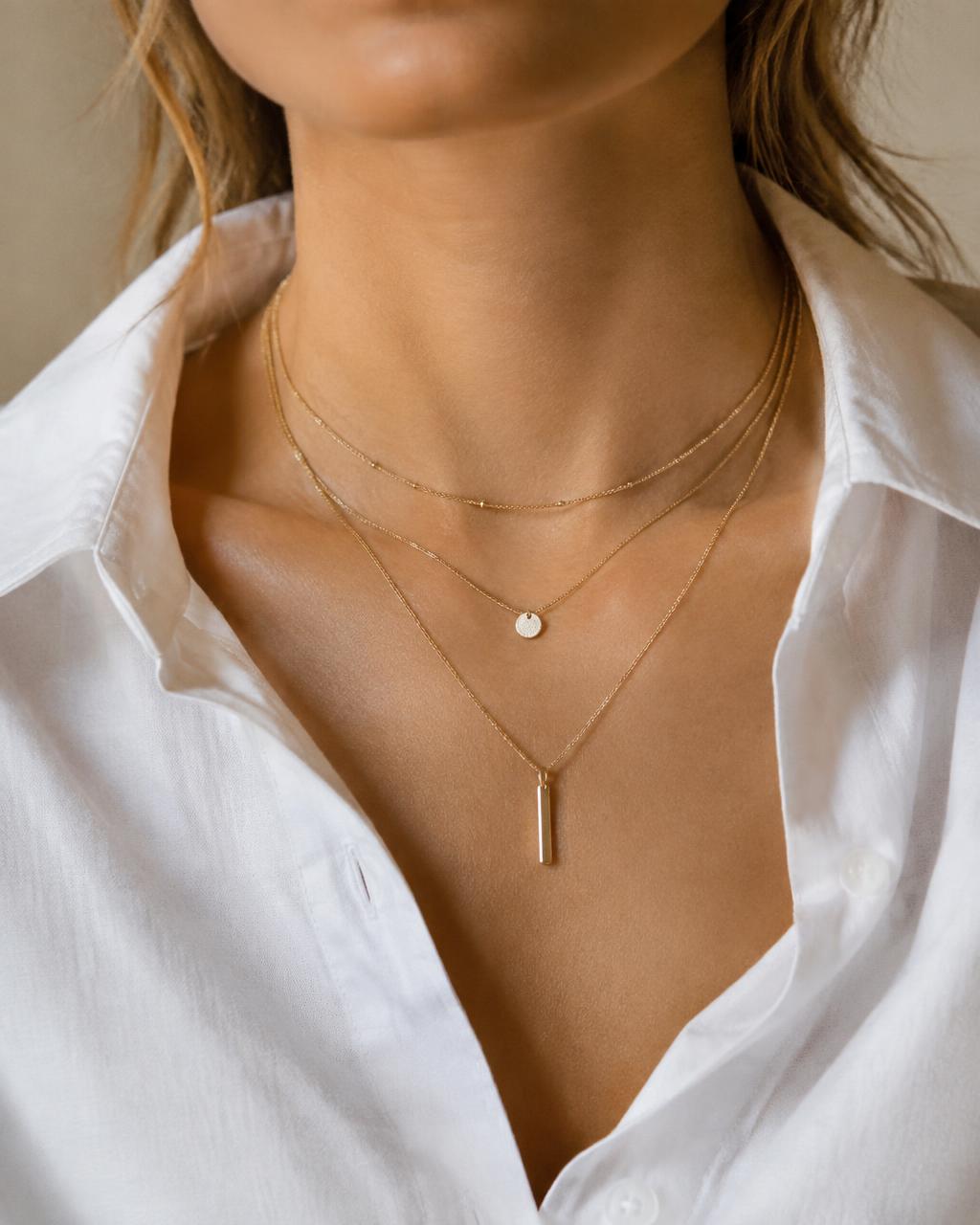 Customer wearing ORIGIN jewelry